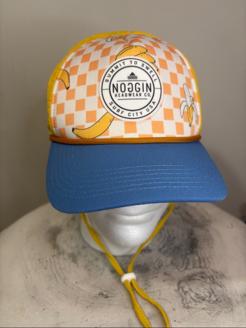 Noggin Headwear Co. Rowan Trucker Hat Banana Print Checkerboard Surf Chin Strap